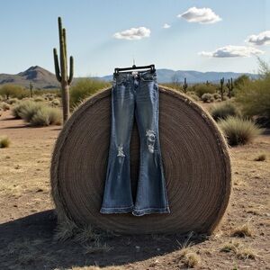 Shyanne Flare Jeans With Side Slits , Stretch & Knee Distressing . Size: 25